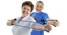 Seniors and Strength Workouts, picture of Caucasian male and female working out with stretch bands